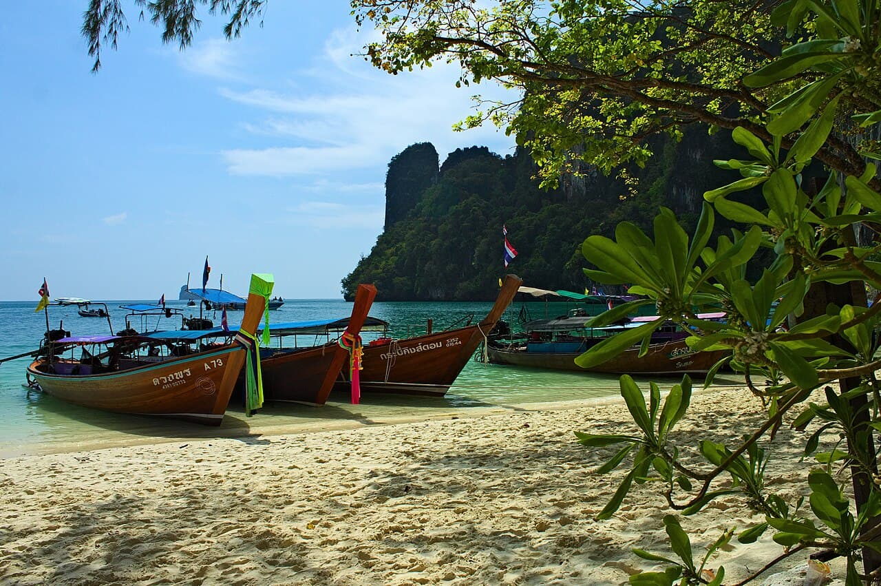Longtail boats on the beach at Hong Island, Krabi